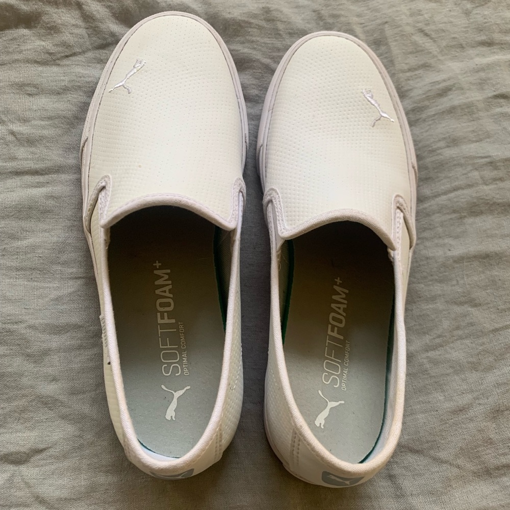 White slip on Puma shoes